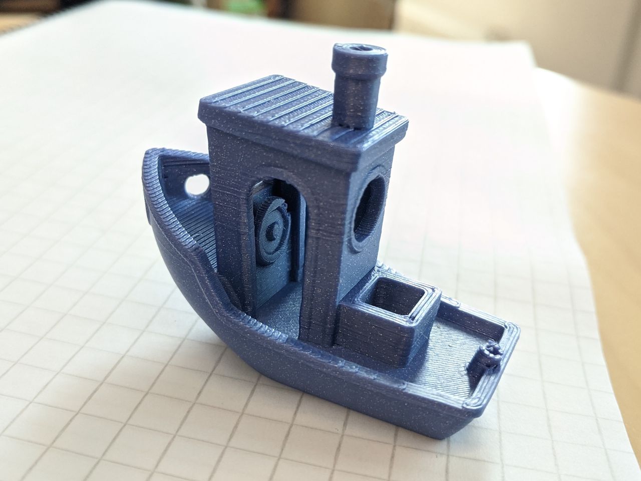 Blue Benchy 3d printed tugboat.