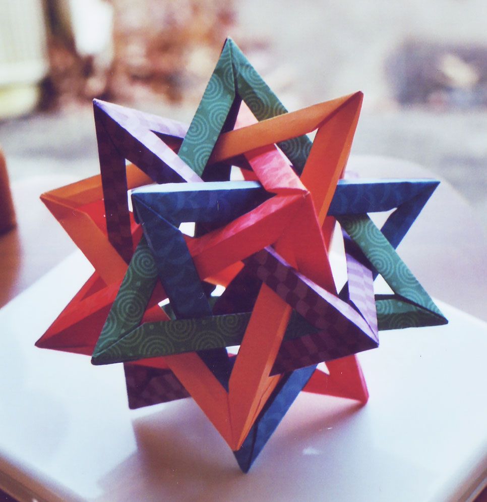 Five Intersecting Tetrahedra folded with color paper, film photograph from 2008.