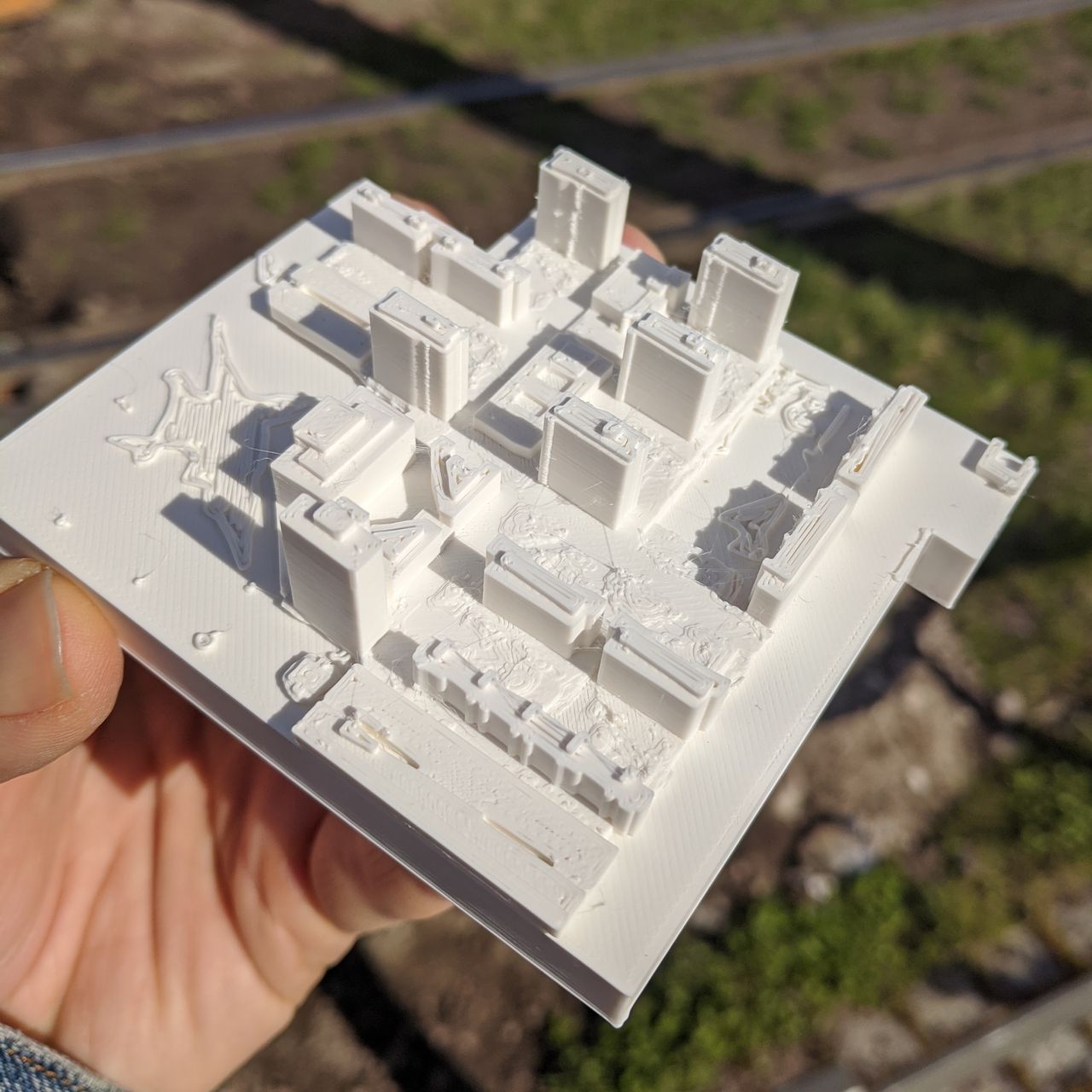 Neighborhood printed with white PLA, showing scale shadows in the sun.